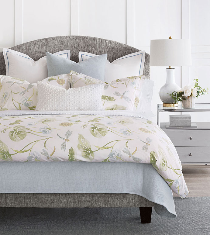 make your guest room inviting with a designer headboard and custom bedding.