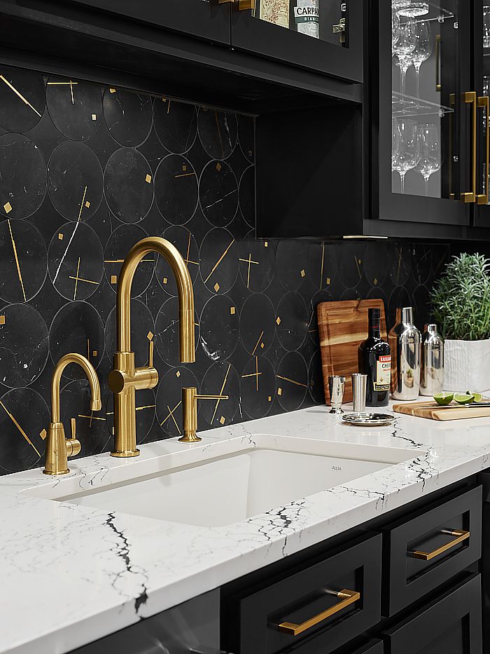 Black and gold makes a statement in this bar.