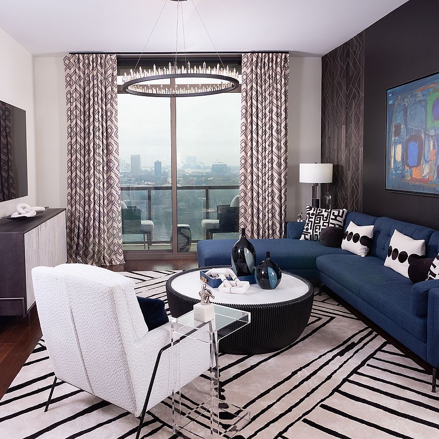 Acrylic and glass coffee tables provide functionality, but also take up less space visually making a room appear larger.