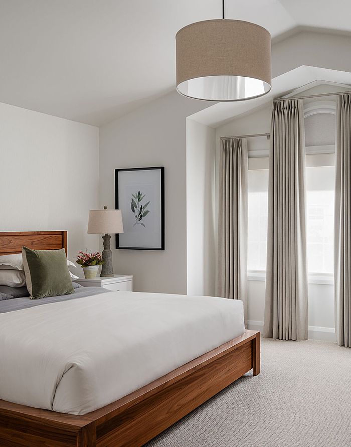 Drapery panels work in conjunction with the shape of the alcove.